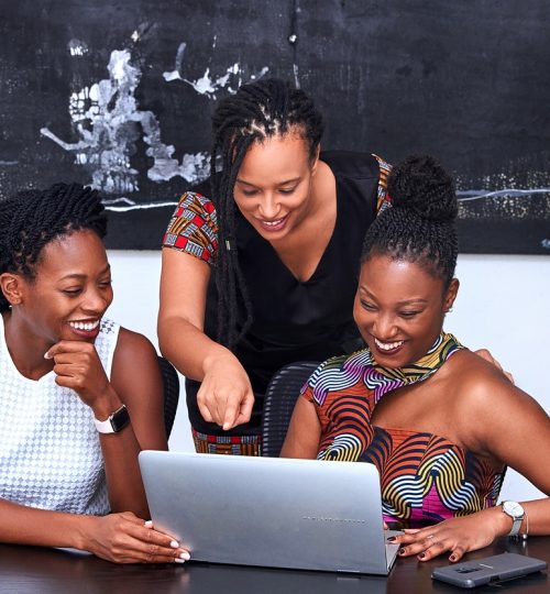 three-women-looking-at-the-computer-3894378